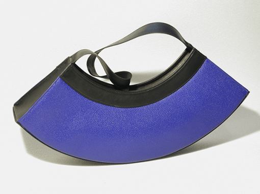 graphic half-moon bag. fine leather goods. unique and elegant bag. electric blue.