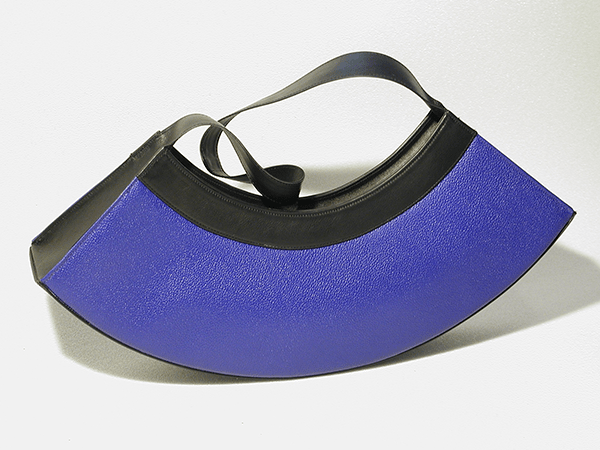 graphic half-moon bag. fine leather goods. unique and elegant bag. electric blue.