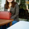 chic little bag with a streamlined style and a pretty burgundy color that goes with every outfit! handmade in Geneva from eco-responsible leathers.