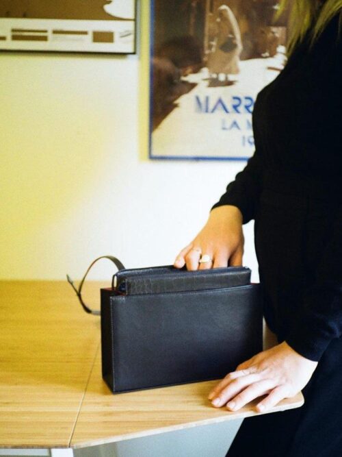 chic little bag with a sleek style that goes with every outfit! handmade in Geneva in smooth eco-responsible leathers with black crocodile print.