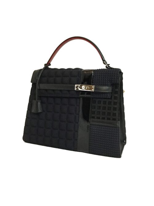 hermes grace kelly bag revisited. unique model and design. timeless and colorful bag. handmade in geneva. craftsmanship.    