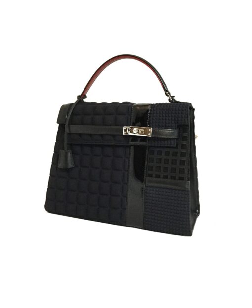 hermes grace kelly bag revisited. unique model and design. timeless and colorful bag. handmade in geneva. craftsmanship.
