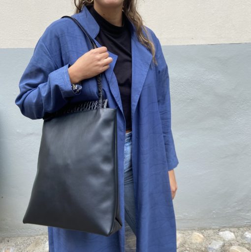 Elegant, streamlined everyday tote. black leather with crocodile print. solid, good-quality leather. A4 computer size. handmade in geneva.