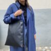 Elegant, streamlined everyday tote. black leather with crocodile print. solid, good-quality leather. A4 computer size. handmade in geneva.