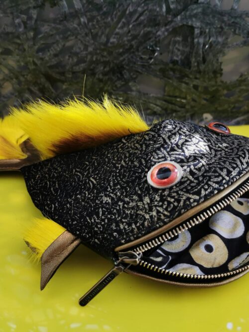 unique and original leather goods. fish bag. savoire-faire in leather goods in geneva. handmade. one-of-a-kind.    